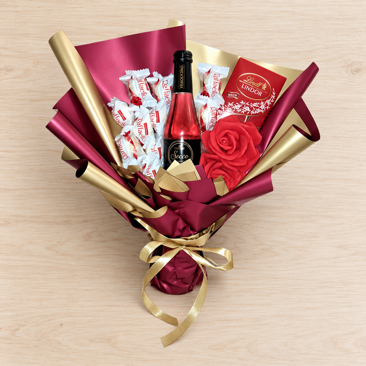 Edible bouquet with Raffaello, Lindt & Vescovino Secco Frizzante Rosa – Elegant gift for special occasions