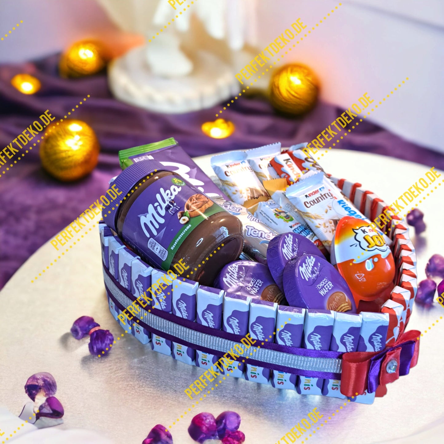 Heart-shaped cake with Milka and Kinder chocolate – perfect gift for chocolate lovers