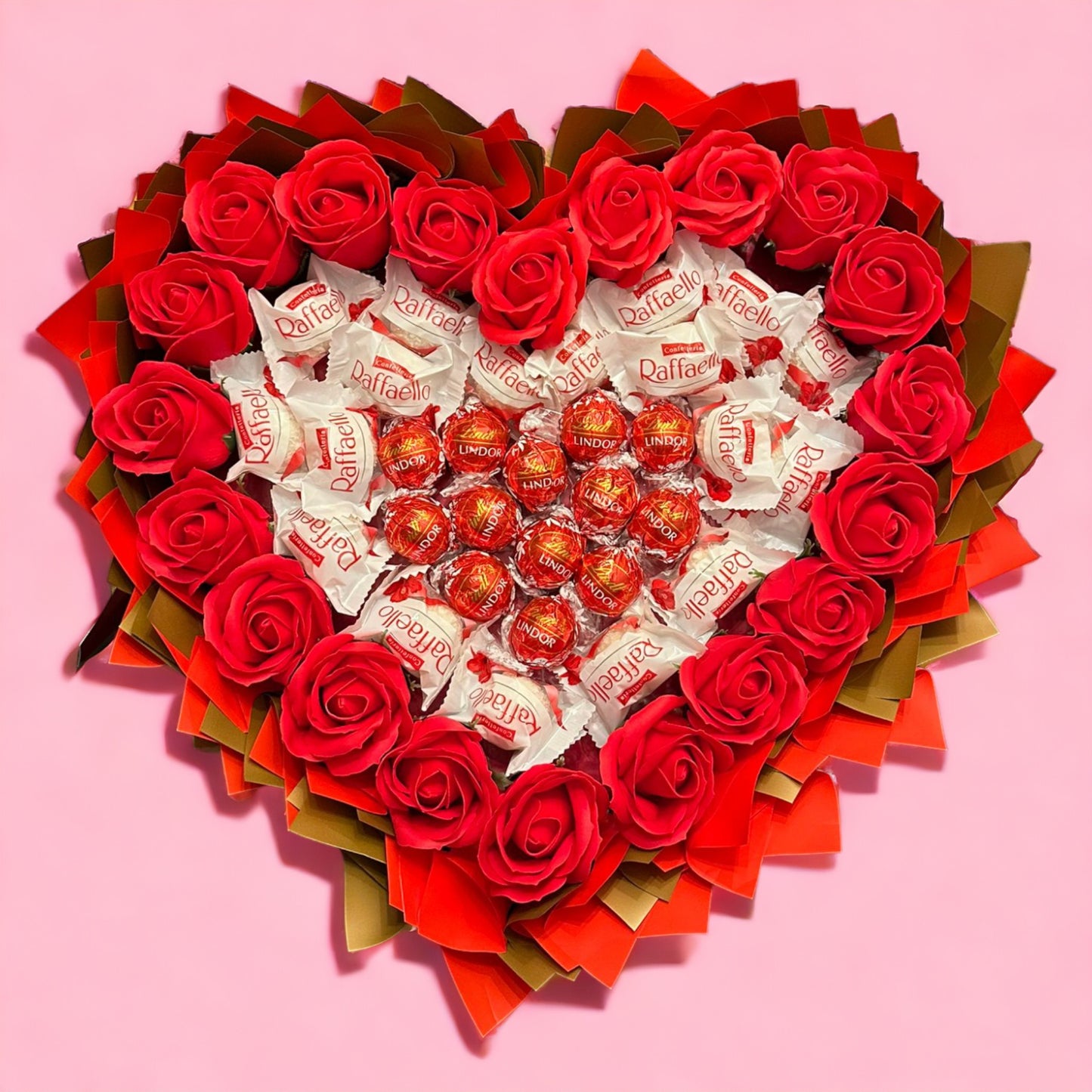 Heart-shaped bouquet with Raffaello, Lindt Lindor & red roses – Romantic gift for special occasions