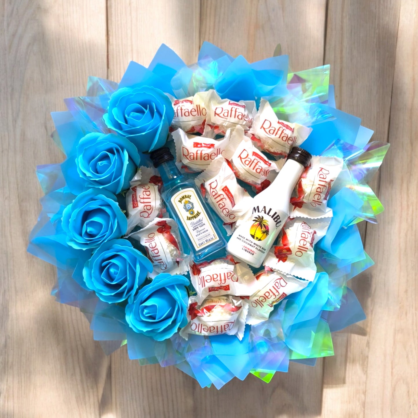Edible bouquet with Raffaello, Gin Bombay, Malibu & blue soap roses – Romantic gift for special occasions