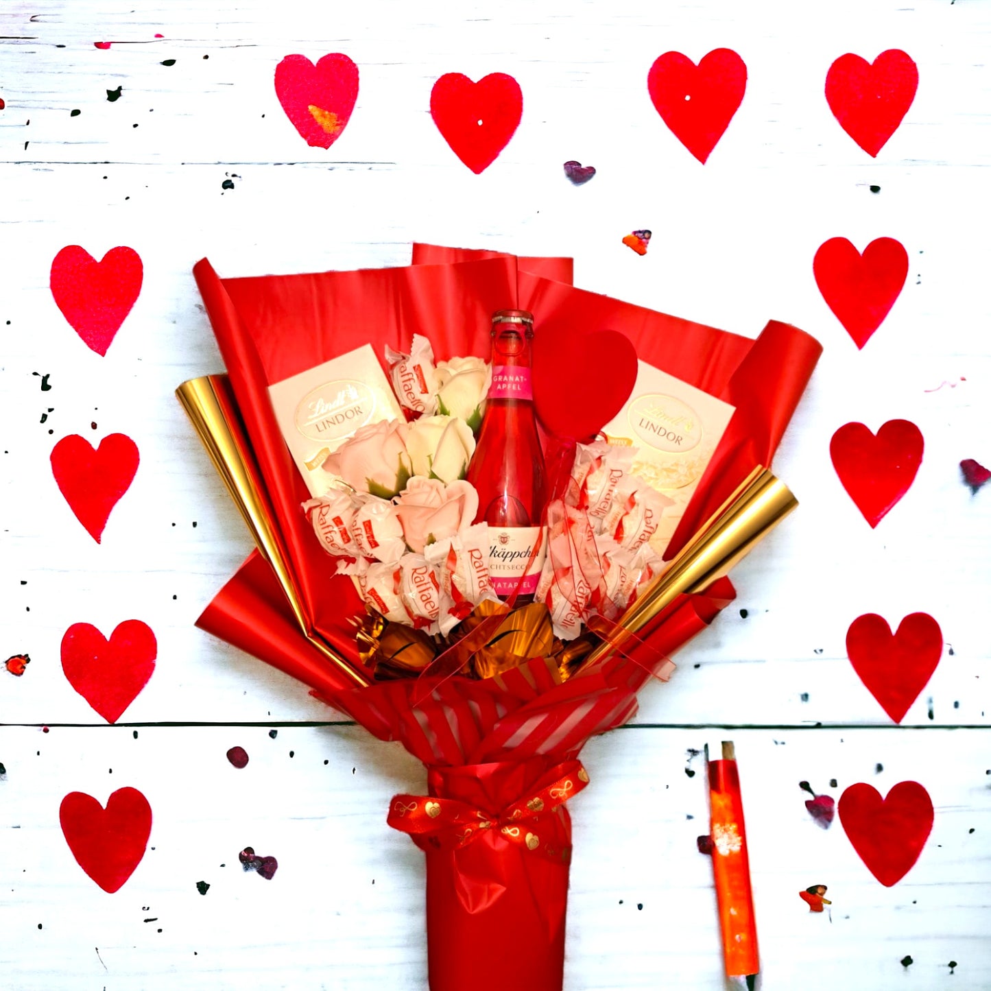 Spiselig buket blomster med Lindt, Raffaello & Rødhætte - elegant gave til særlige lejligheder