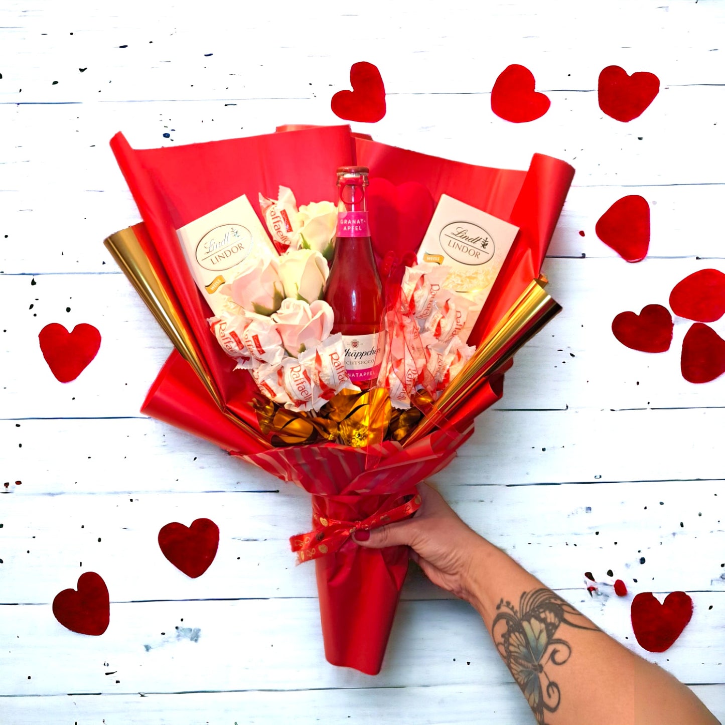 Spiselig buket blomster med Lindt, Raffaello & Rødhætte - elegant gave til særlige lejligheder