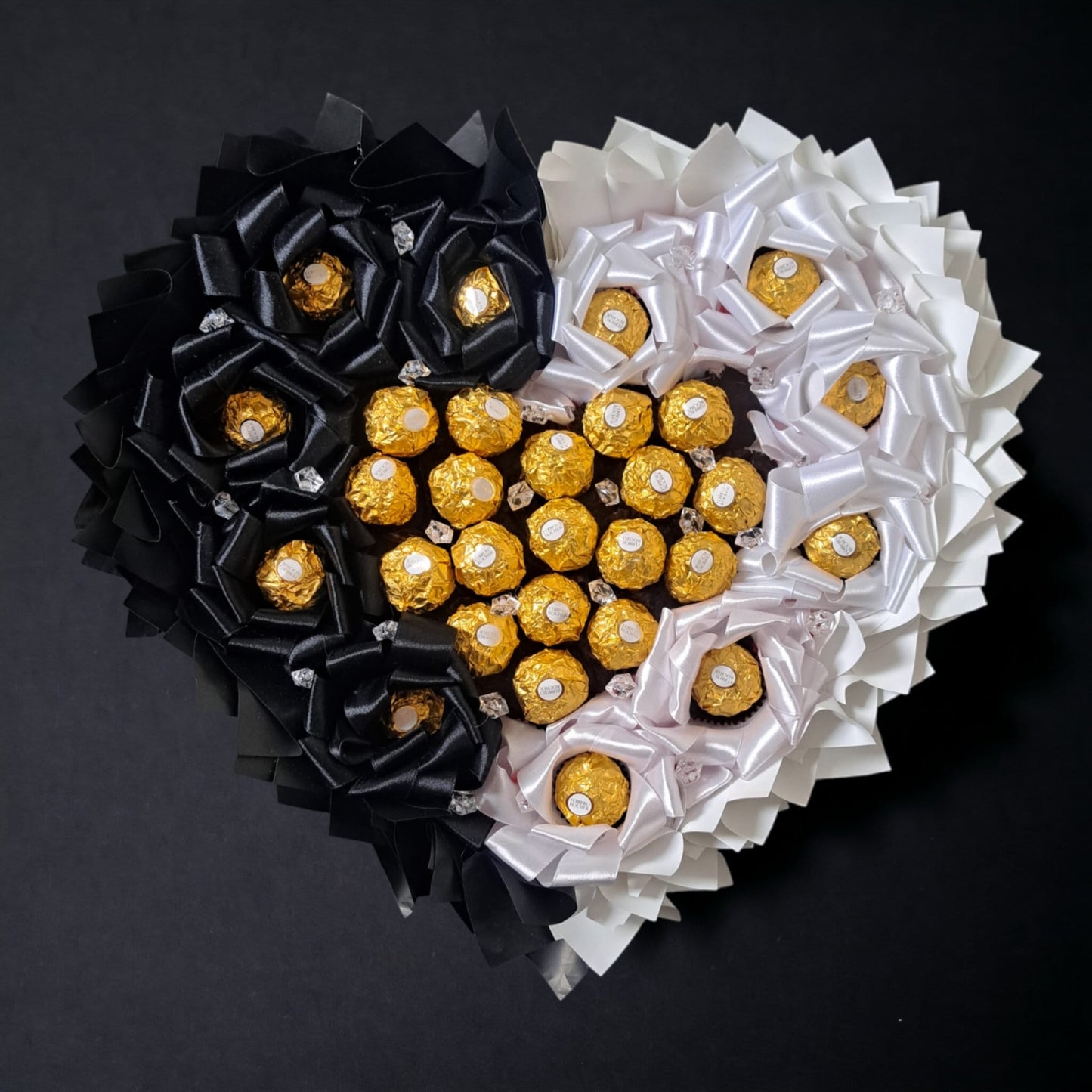 Exclusive Ferrero Rocher chocolate bouquet – noble gift with praline heart and satin ribbons for special occasions
