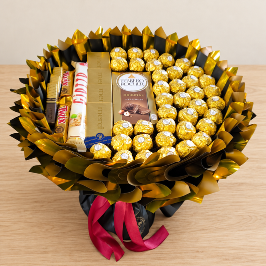 Schokoladenstrauß in Schwarz-Gold mit Ferrero Rocher, Merci und Twix