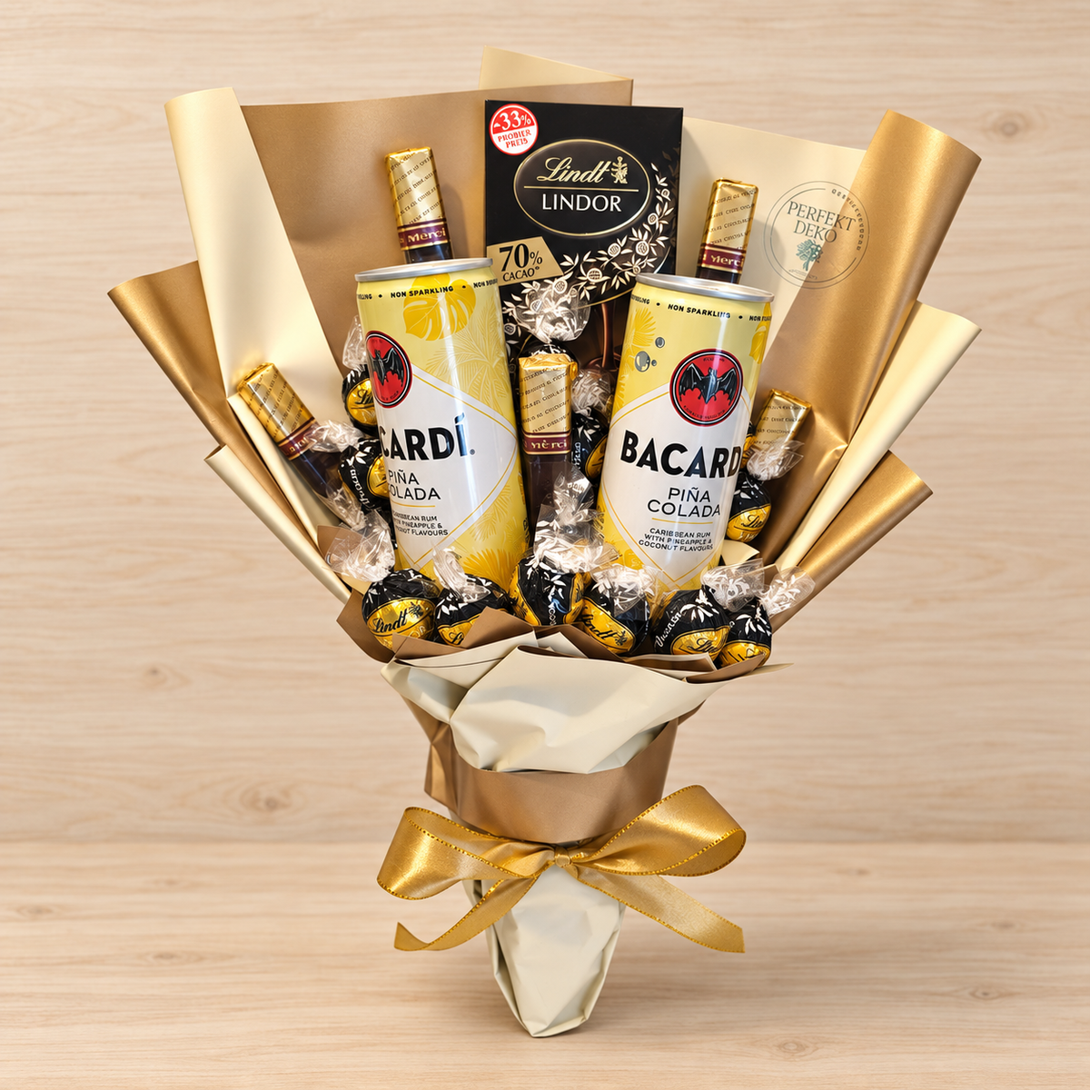 Exquisite bouquet of pleasure with Lindt Lindor, Merci &amp; Bacardi Pina Colada – Luxurious gift for connoisseurs