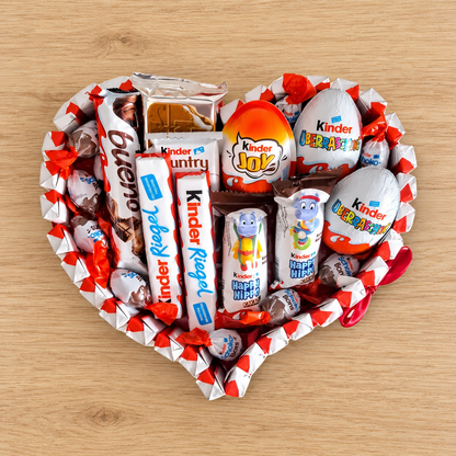 Heart-shaped cake with Kinder sweets – perfect gift idea for any occasion