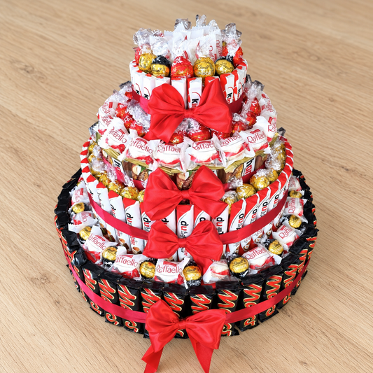 Luxus XXL Süßigkeiten-Torte 4-stöckig – Riesige Premium Geschenk Torte mit Mars, Hanuta, Duplo, Raffaello & Lindt Lindor
