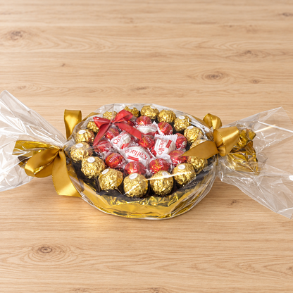 Goldglanz im Bonbonformat – Pralinengeschenk mit Ferrero Rocher, Lindor & Raffaello