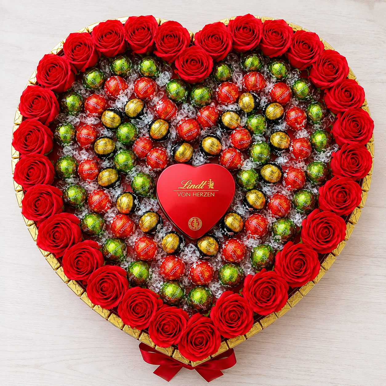Queen Heart – Exklusiver Lindt Lindor Pralinenstrauß mit Seifenrosen