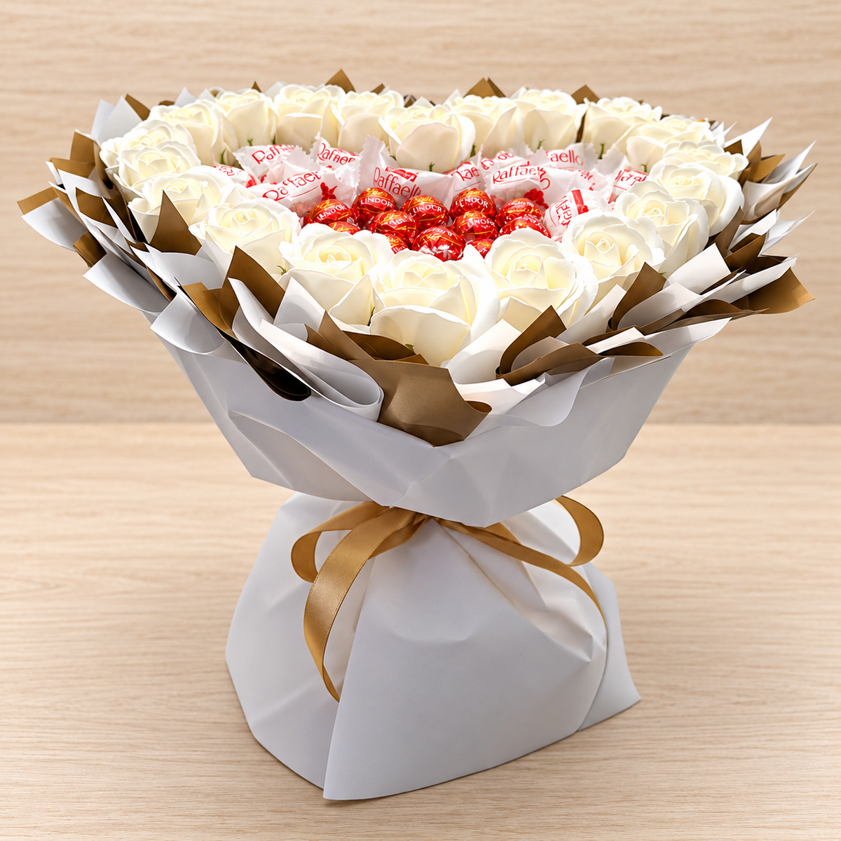 Heart-shaped bouquet with Raffaello, Lindt Lindor &amp; white roses – Elegant gift for romantic occasions 