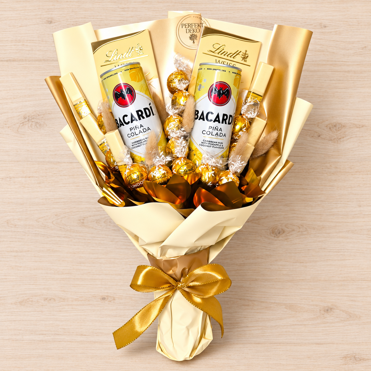 "Bacardi" pleasure bouquet - luxurious gift with Lindt, Merci &amp; Bacardi Pina Colada 