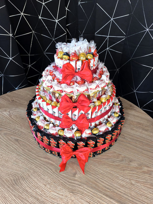 Süße Torte mit Kinder Riegel, Raffaello, Ferrero Rocher, Lindor und Mars