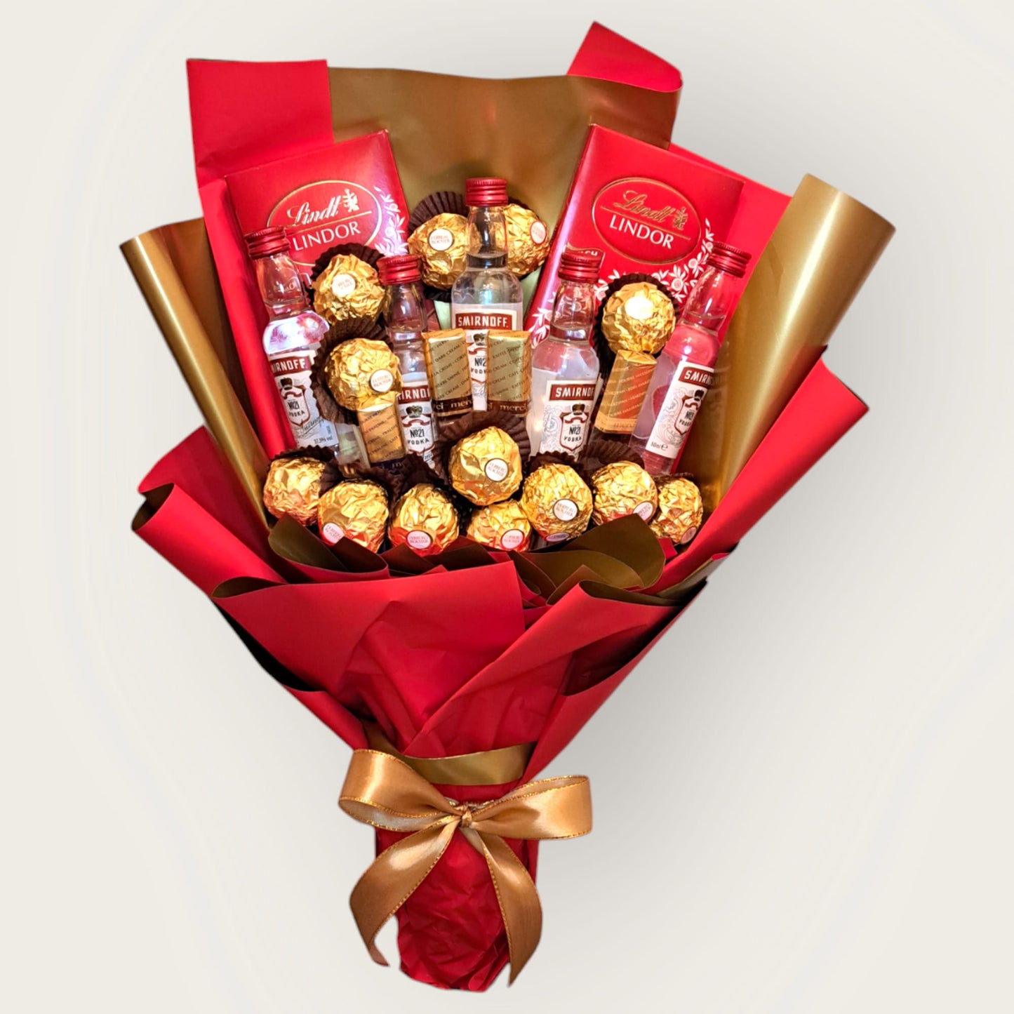 Ferrero Rocher & Lindt Lindor Bouquet mit Smirnoff Vodka – Exklusives Geschenk für Genießer