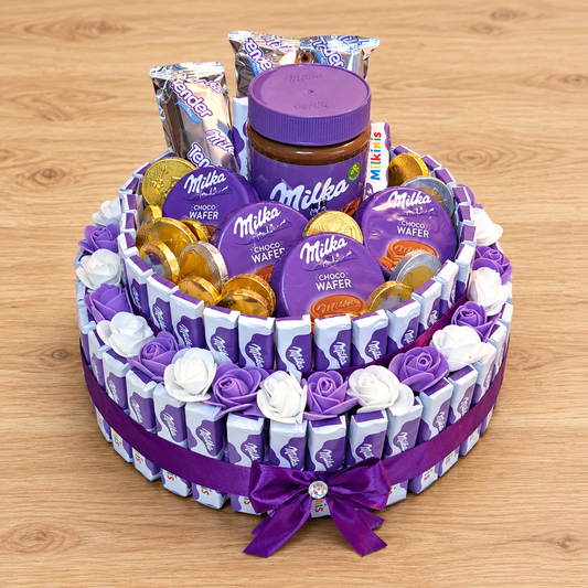 Milka Schokoladentorte Deluxe mit Milka Creme & Schaumrosen